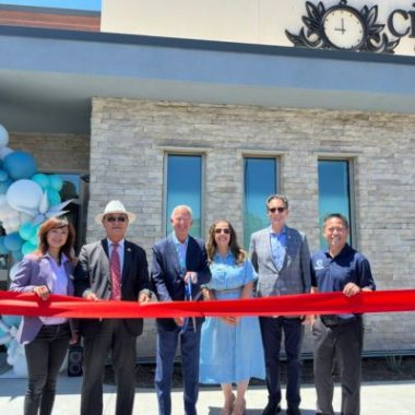 Officials prepare to cut the ribbon at The Creme School of Great Park in Irvine, Calif.