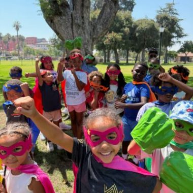 Crown Me camp kids learning about Black innovators and Afrofuturism.