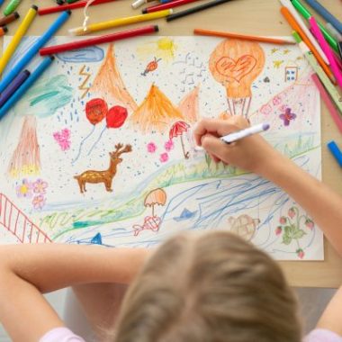 photo of a child drawing