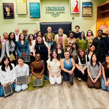 An Omega Sci-Fi group shot of The Tomorrow Prize finalists, teachers and board members at Vroman's Bookstore.